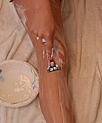 Blonde teen Faith Belle shaving her legs after showering - 012.jpg