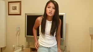 Lovely asian teen Kat filming while exploring her pussy