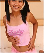 Hot asian teen Kat Young strips and shows inviting clit