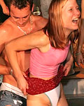 Muscular strippers seducing hot drunken girls at wild party